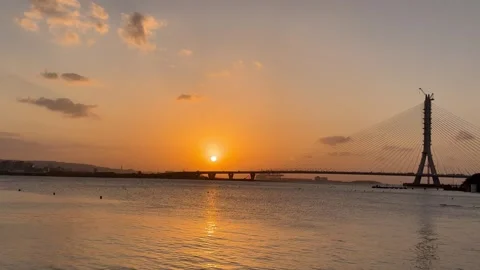4K Sunset over Danjiang Bridge and Tamsui River in Taiwan-Landscape Video stock 328149448
