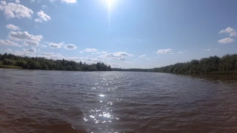 4K Sunset over the lake or river. View from a boat Stock Footage 113204067