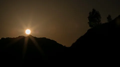 4k Sunset Over The Mountains. Sun movement wild Nature Stock-Footage 87830841