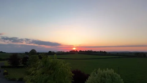 4K Sunset Over Rural Fields and Horizon Stock-Footage 333928598