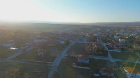 4K Sunset Over Small Town from Above Stock Footage 314469343