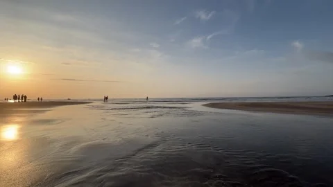 4K Sunset Reflection on Tamsui Shalun Beach Taiwan Stock Footage 334593422
