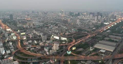 4K Sunset Time lapse Aerial view express way busy Bangkok city rush hour 스톡 동영상 64028221