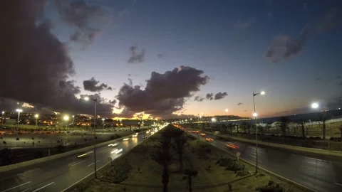 4k Sunset Time lapse in Highway of Algiers city and Public light turning on Stock Footage 154894372