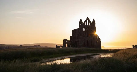 4K sunset time lapse of Whitby Abbey in North Yorkshire, UK Stock Footage 35146318