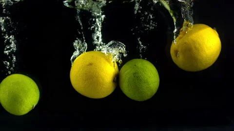 4K Super 1000 FPS Slow-Mo Of Lemons And Limes Floating In Water Stock Footage 151391748