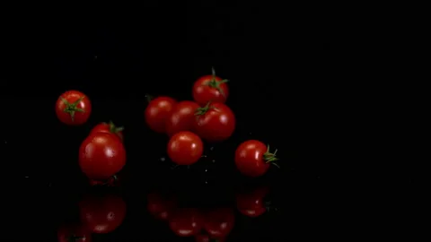4K Super 1000 FPS Super Slow-Mo Of Cherry Tomatoes Falling On Ground Stock Footage 151532547