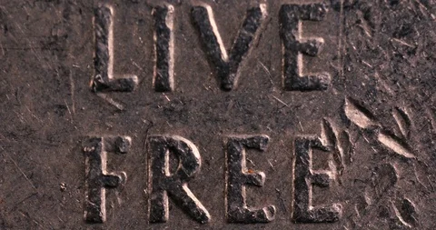 4k Super Macro Close Ups- U.S. Currency- "Live Free" Printed on Quarter Stock Footage 129395086