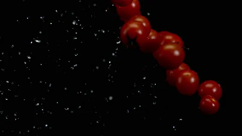 4K Super Slow-Mo Of Cherry Tomatoes Flying In Air Stock Footage 151446696