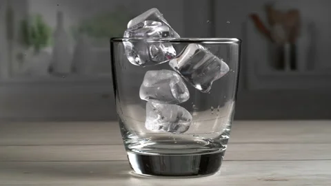 4k Super Slow Motion Shot of Ice Cubes Falling into Glass at 1000 fps. Stock Footage 217739031