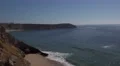 4k Surfers wating wave beautiful coastline cliffs beach Sagres Portugal 4k or 4k+ Resolution