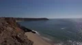 4k Surfers wating wave beautiful coastline cliffs beach Sagres Portugal 4k or 4k+ Resolution