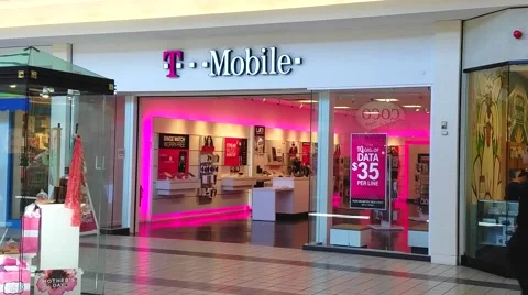 4K T Mobile wireless network carrier, mall storefront Stock Footage 63150012