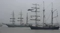 4k Tall ships and coastguard helicopter in Bremerhaven harbor at rainy day 4k or 4k+ Resolution