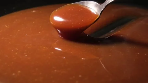 4K Teaspoon Scooping Salted Caramel Stock Footage 332508340