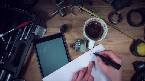 4K Technical Shot from Above of Hand Sketching Plan Video stock 73753339