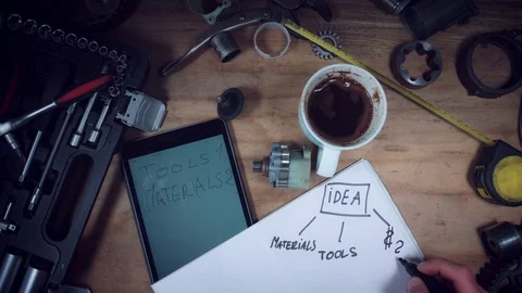 4K Technical Shot from Above of Tablet and Paper Drawing Stock Footage 73753812