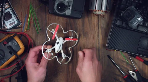 4k Technology Composition from Above of Drone Being Disassembled Stock Footage