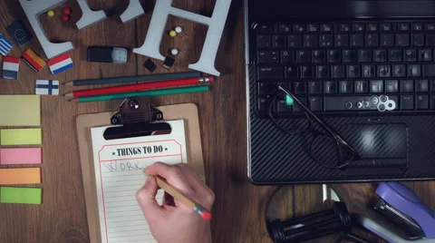 4k Technology Composition from Above of Hand writing 'Work' Stock Footage