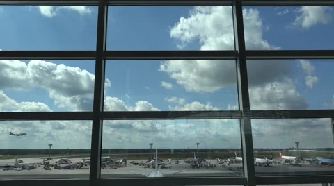 4k Terminal window airfield view landing aeroplane Airport Frankfurt Main Stock Footage 65401527