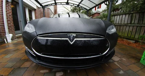 4k Tesla Model S Close up Front of car in driveway Video stock 137623746