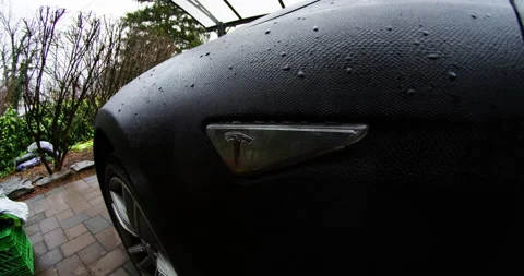 4k Tesla Model S drivers side logo front fender Stock Footage 137621972
