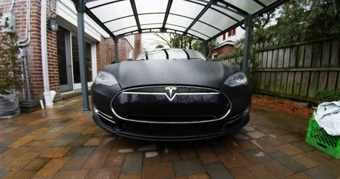 4k Tesla Model S front shot in driveway Stock Footage 137623491