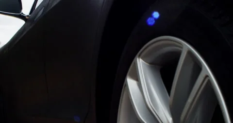 4k Tesla Model S Gimbal movement of side and front of car Stock Footage 137617018