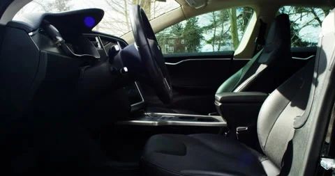 4k Tesla Model S interior from Drivers side outside Stock Footage 137610157