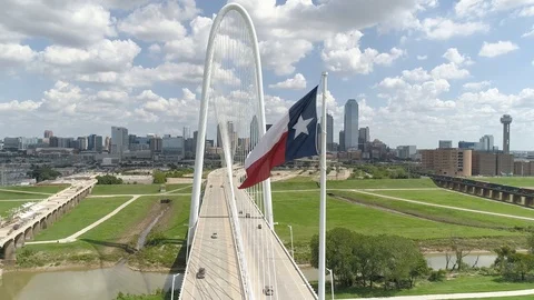 4K Texas Flag Slow Motion with Dallas Texas Skyline in Background Stock Footage 95824531