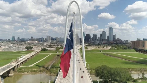 4K Texas Flag Waves over Dallas Texas Aerial Stock Footage 95824817