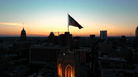 4K Texas State Flag San Antonio Skyline Aerial Stock Footage 119734968