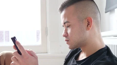 4K Texting student on smartphone Stock Footage 47931034