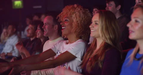 4K Theatre audience clapping the performers on stage (focus on the audience) Stock Footage