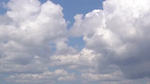 4K. There are many small clouds in the sky. Stock Footage 130946719