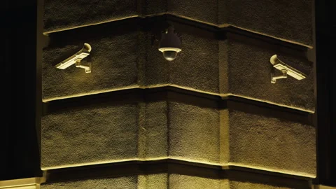 4K: Three security cameras are fixed on building facade at night Stock Footage 271161510