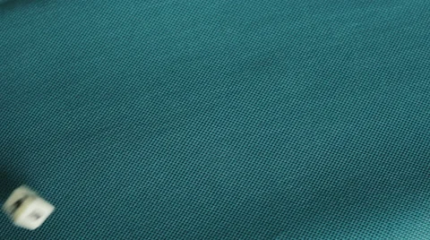 4K throwing a white backgammon doubling cube getting sixteen Stock Footage 51357537