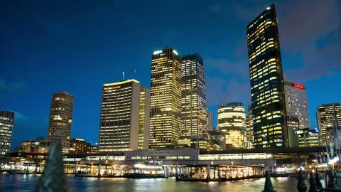A 4k tilt down timelapse from the sky to the water over the Circular Quay Stock Footage 71073482