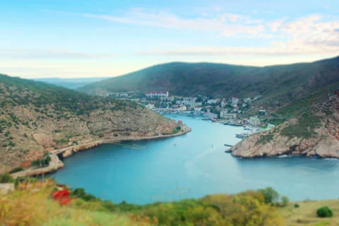 4K. A tilt shift shot sunrise in the mountains.  Stock Footage 32152656