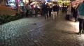 4k Tilt shot Christmas fair with yellow christmas tree illumination 4k or 4k+ Resolution