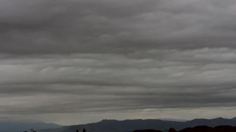 4K Time of Cloud Deck with Waves over Mountains 스톡 동영상 54718627