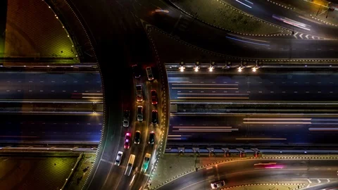 4K Time Lapse Aerial view road roundabout intersection in the city at night. Stock Footage 106284887