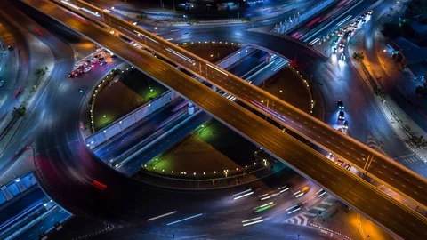 4K Time Lapse Aerial view road roundabout intersection in the city at night. Stock Footage