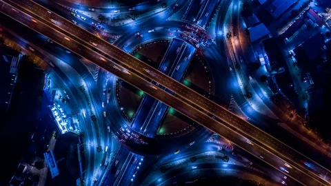 4K Time Lapse Aerial view road roundabout intersection in the city at night. Stock Footage 106285371