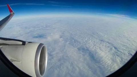 4K Time Lapse Airplane Wing In Flight Through Plane Window Stock Footage 70360551