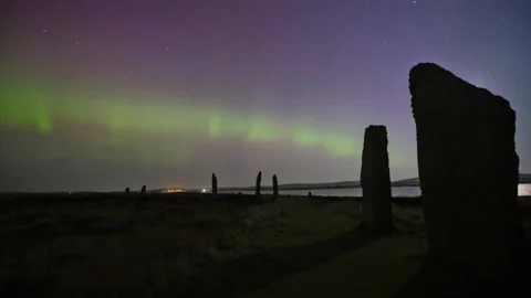 4k time lapse of aurora at the ring of brodgar with the moon rising Stock Footage 301107707