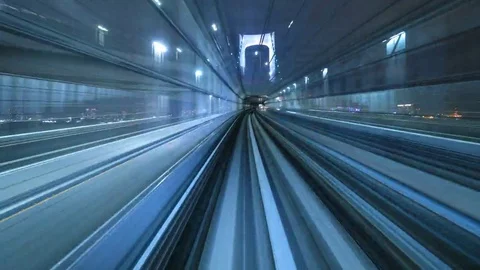 4K Time lapse of automatic train moving to tunnel, Tokyo, Japan Stock Footage