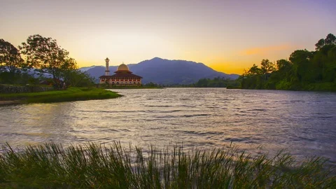 4K Time-lapse of beautiful Darul Quran mosque during sunrise Stock Footage 115562135