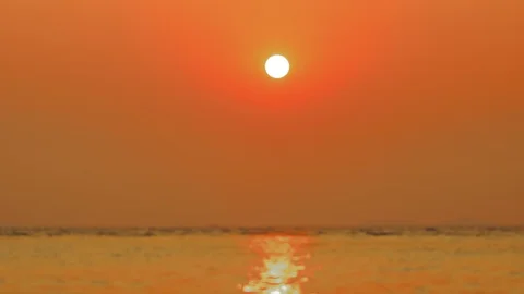 4K time lapse of beautiful orange sunset over the sea. Stock Footage 86471937