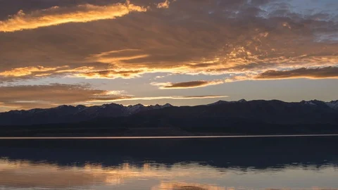 4k time lapse of Beautiful sunset over Lake Pukaki, New Zealand Stock Footage 128080254